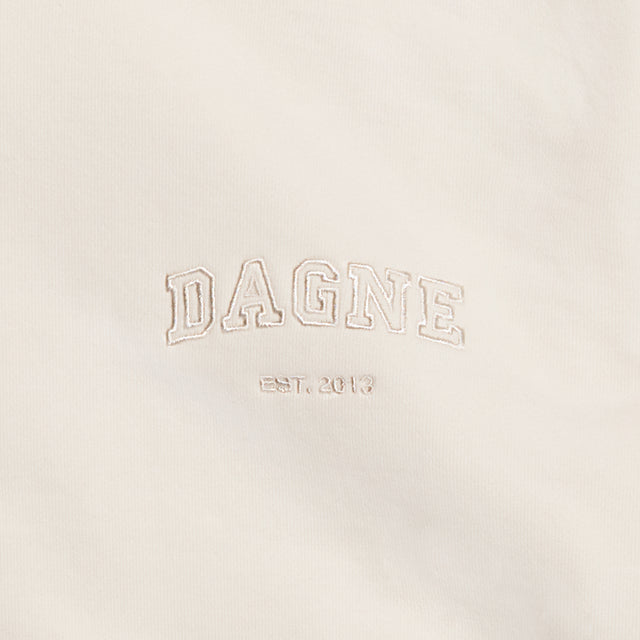 Dagne Dover Hooded Sweatshirt logo closeup in moonbeam.