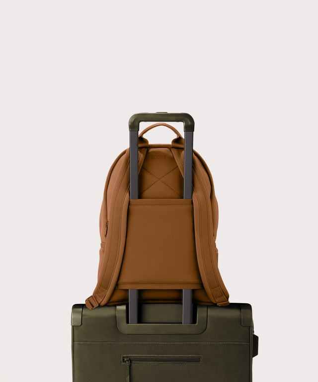 Medium Dakota in a saturated, warm medium-brown with burnt orange undertones. displaying luggage sleeve
