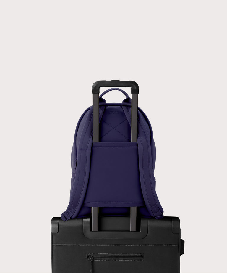 Medium Dakota in a jewel-toned, deep blue with strong purple undertones. displaying luggage sleeve

