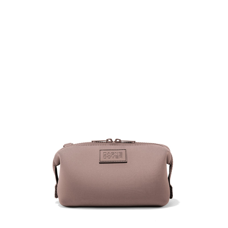 Dagne Dover Small Hunter Toiletry Bag in pink.