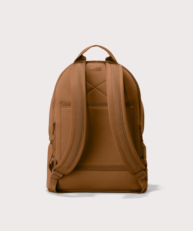 Large Dakota in a saturated, warm medium-brown with burnt orange undertones., displaying an exterior phone pocket. Back view. 
