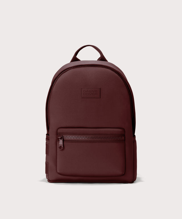 Dagne Dover Medium Dakota Neoprene Backpack in a deep brown with purple undertones.