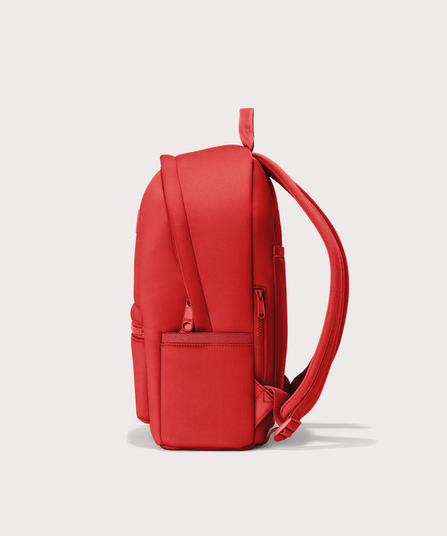 Dagne Dover Medium Dakota Backpack in a fiery, saturated red leaning toward orange seen from the side.