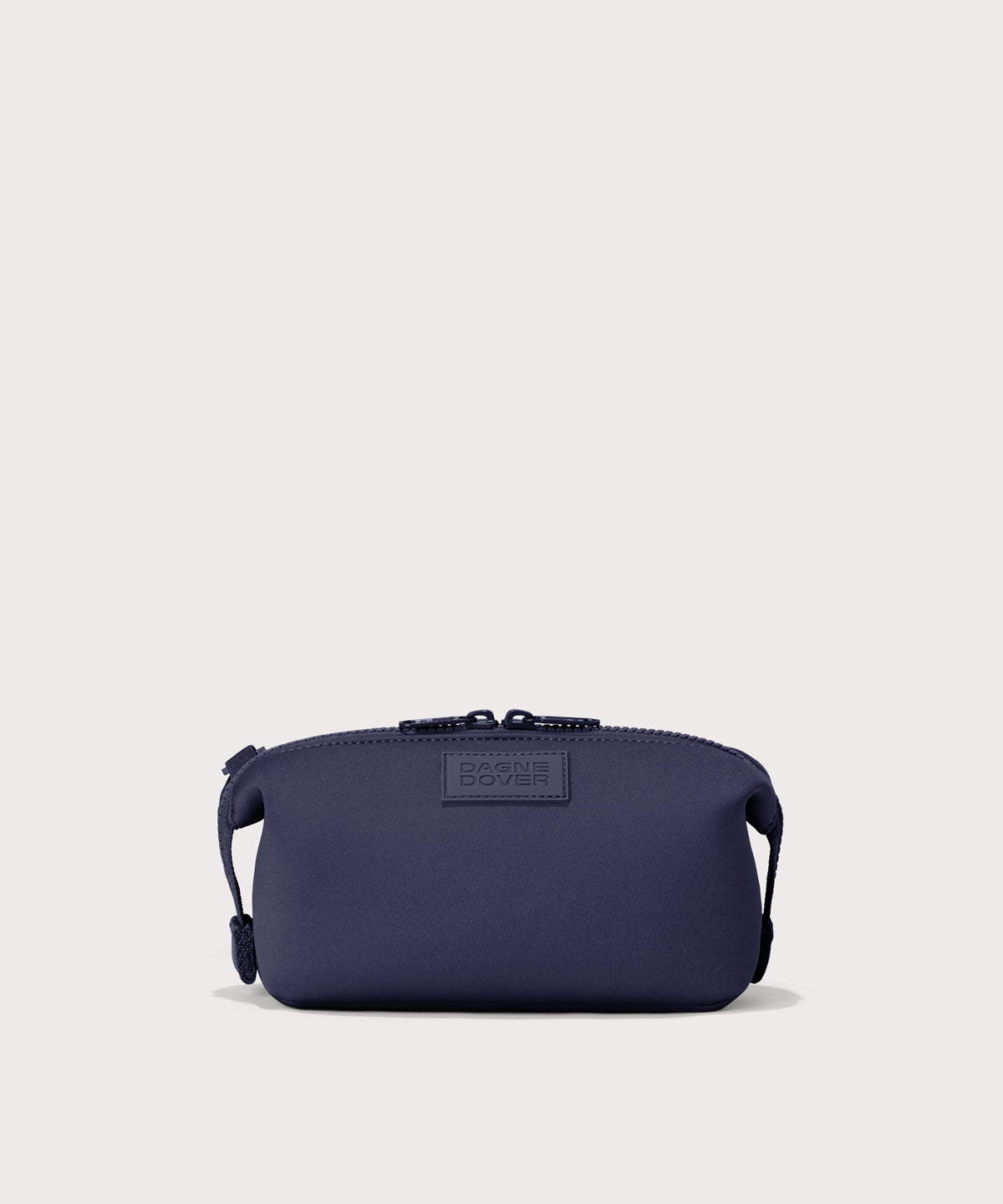 Dagne Dover Small Hunter Toiletry Bag in dark blue.