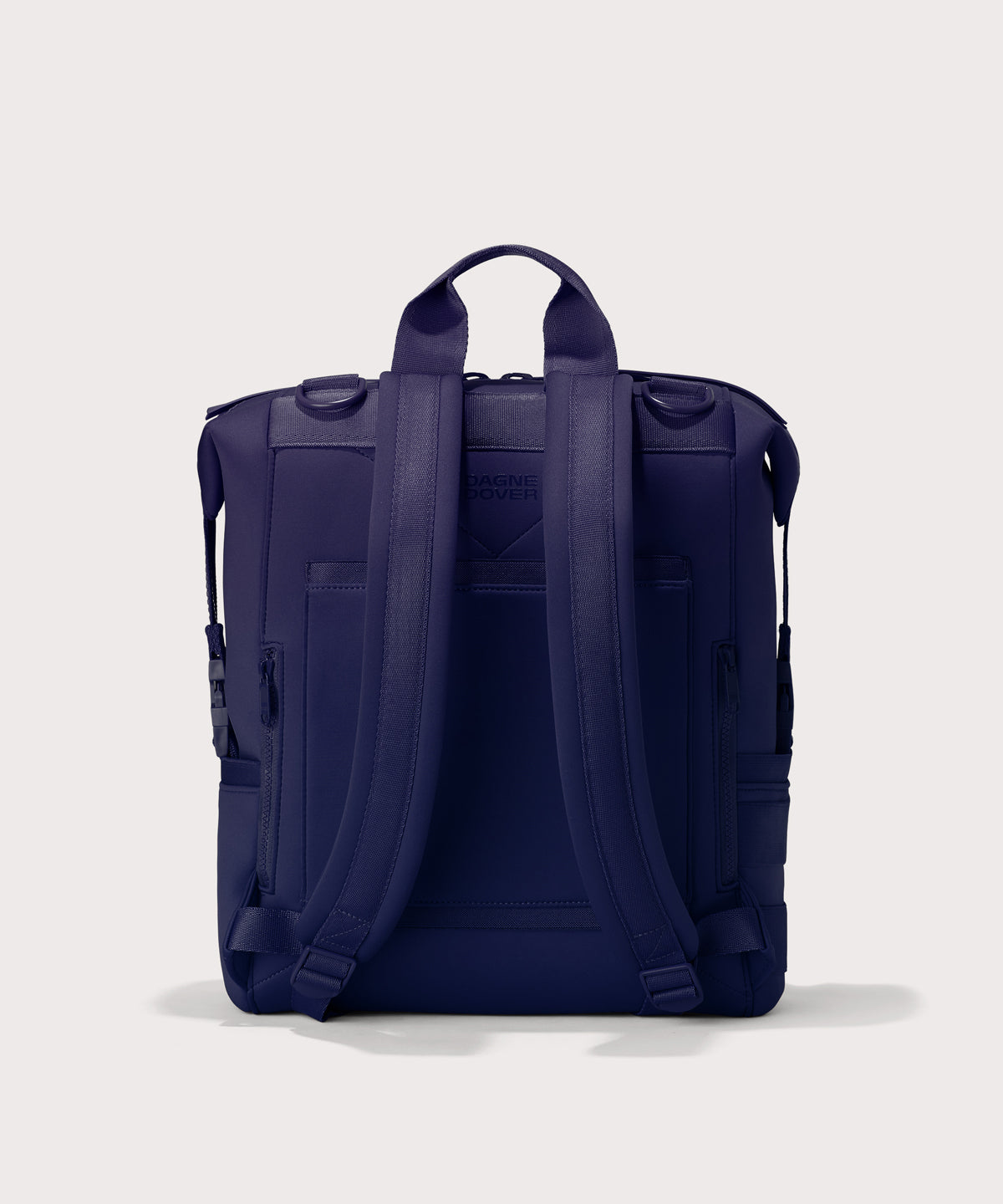 Large Indi backpack in a jewel-toned, deep blue with strong purple undertones. Back view. 
