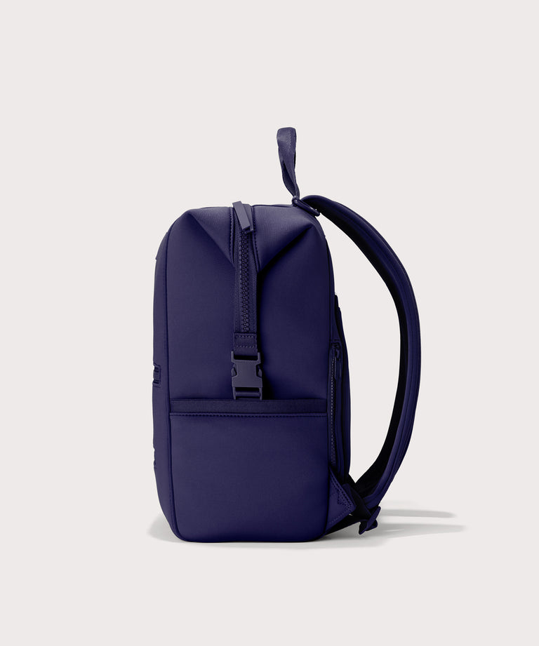 Large Indi backpack in a jewel-toned, deep blue with strong purple undertones., side view
