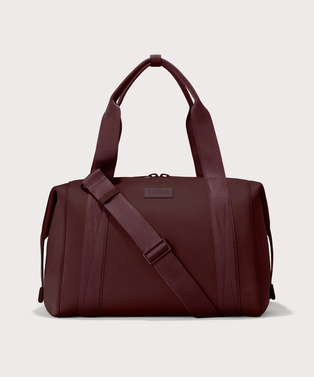Dagne Dover Large Landon Carryall in a deep brown with purple undertones.