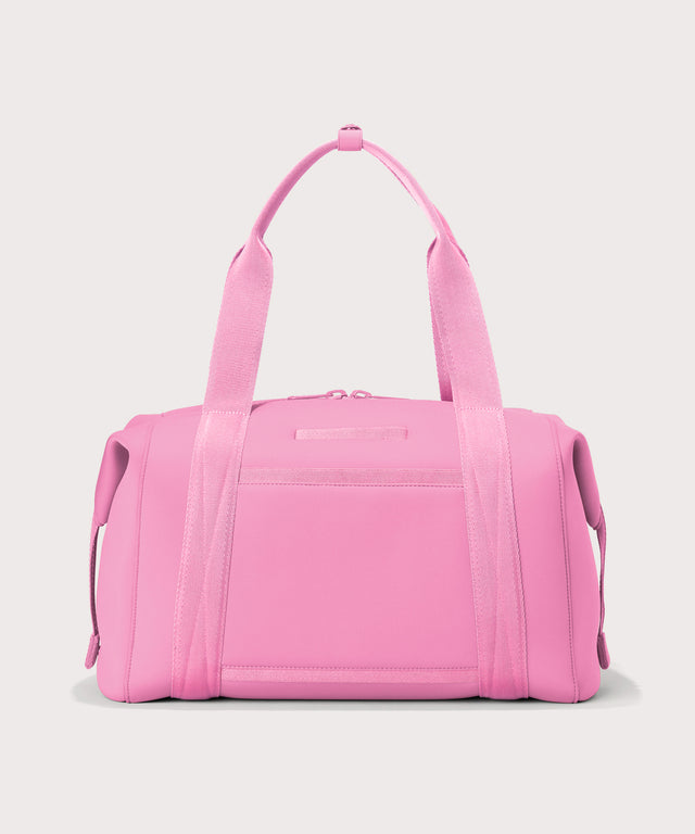 Dagne Dover Large Landon Carryall in a true bubble gum pink seen from the back.