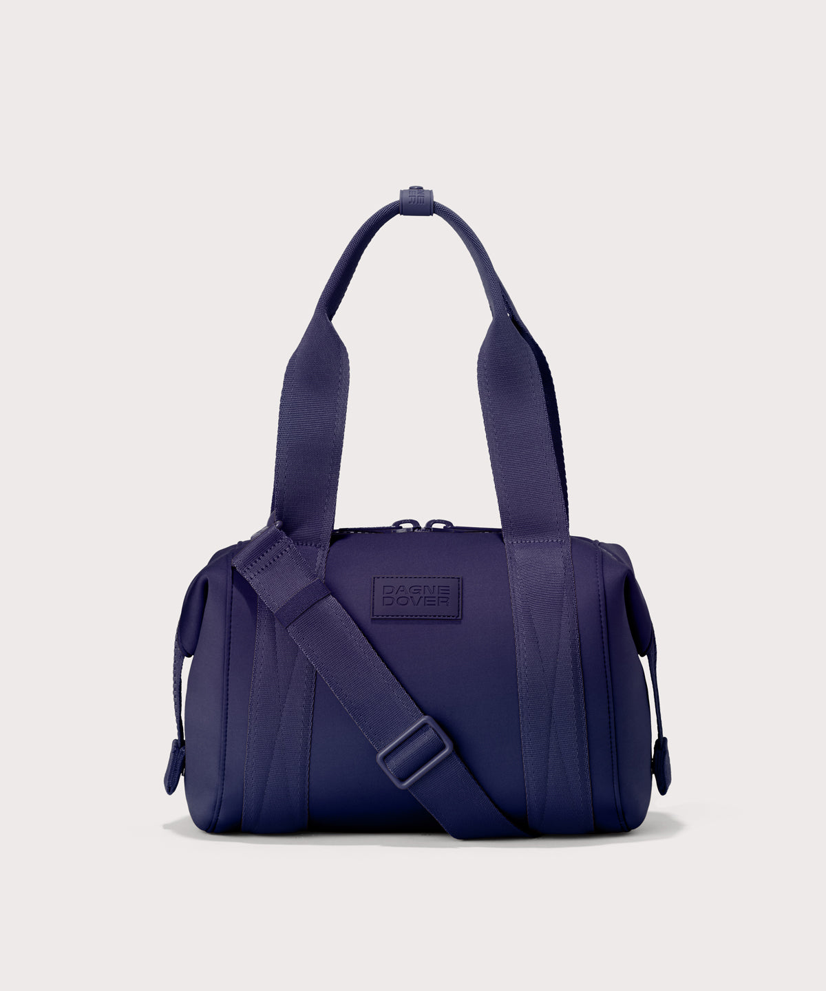 Small Landon Carryall in a jewel-toned, deep blue with strong purple undertones
