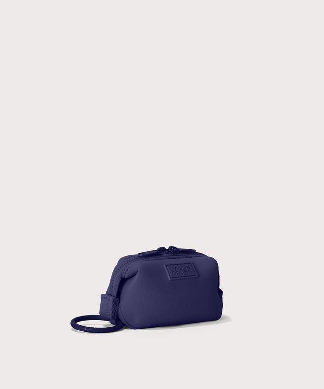 Hunter keychain in a jewel-toned, deep blue with strong purple undertones.  side angle view
