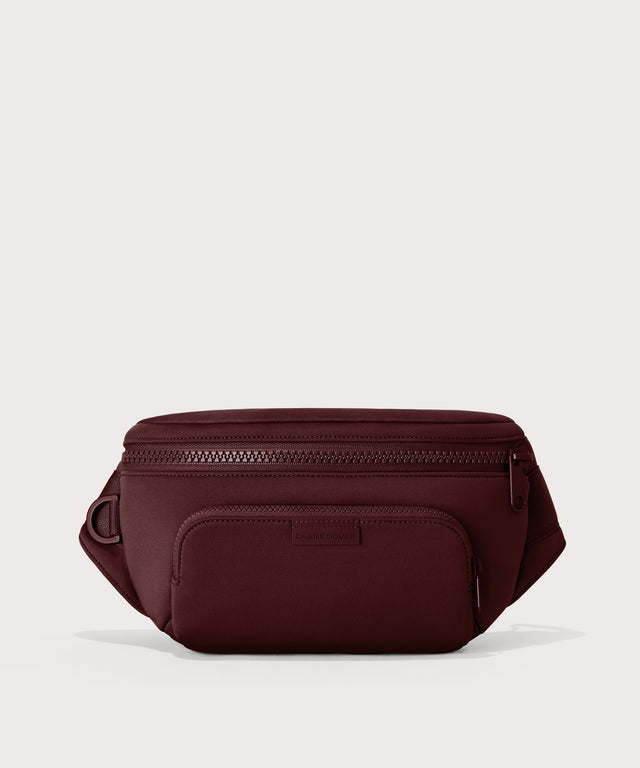 Dagne Dover Jax Large Fanny Pack in a deep brown with purple undertones.