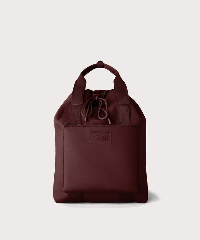 Rhys Backpack in a deep brown with purple undertones.