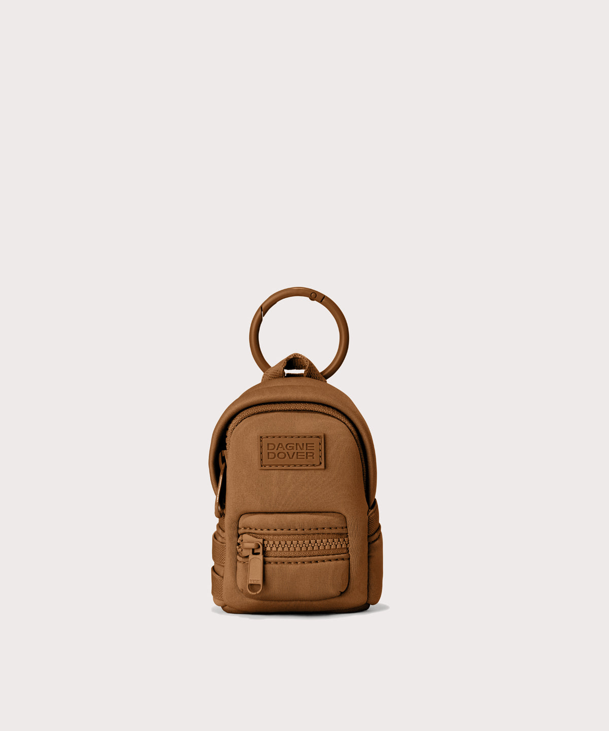 Dakota keychain in a saturated, warm medium-brown with burnt orange undertones.
