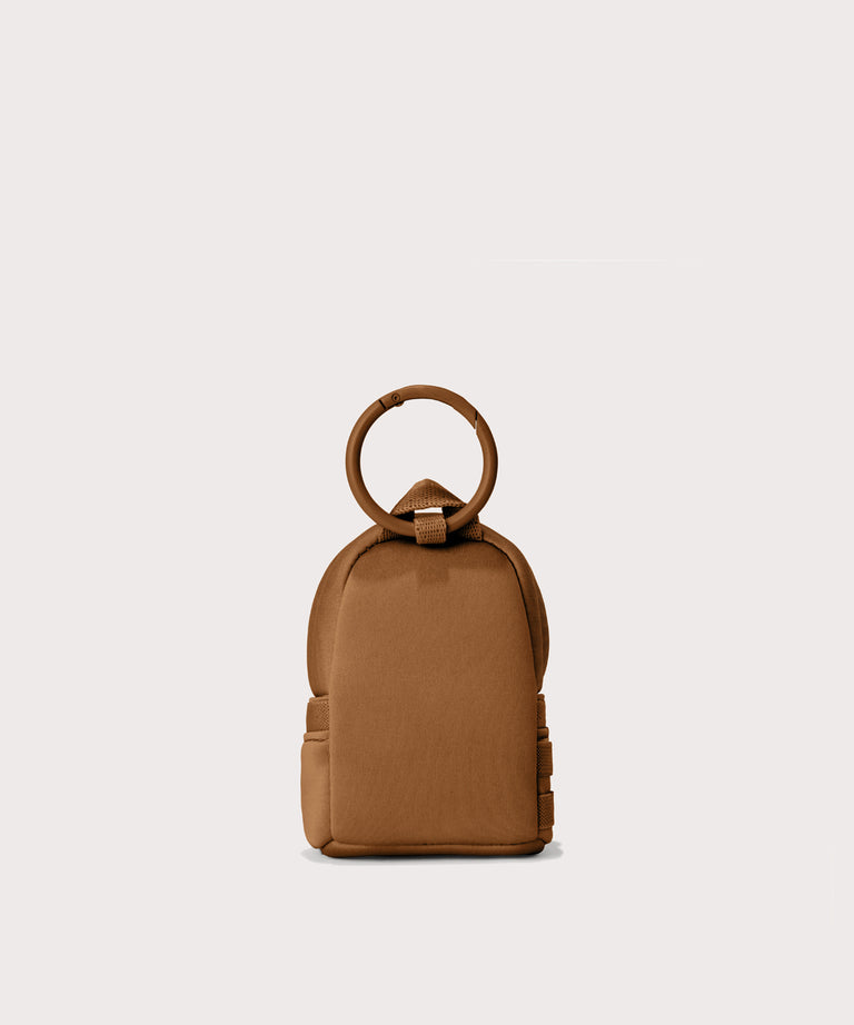 Dakota keychain in a saturated, warm medium-brown with burnt orange undertones. Back view. 
