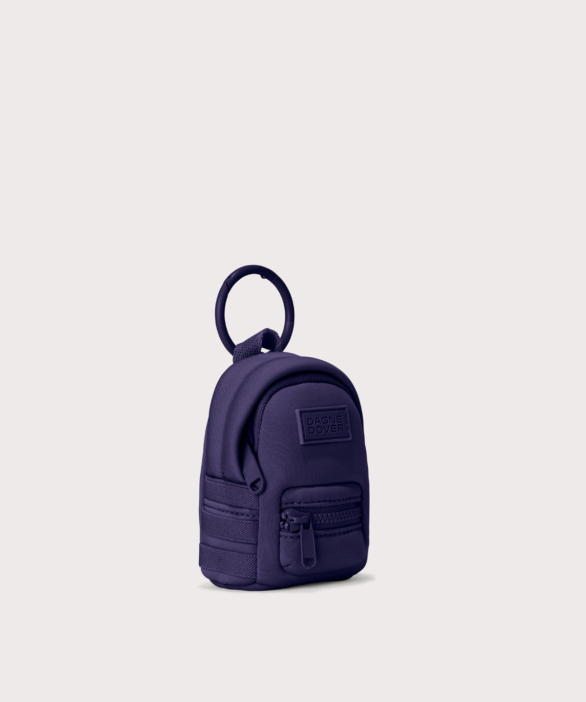 Dakota keychain in a a jewel-toned, deep blue with strong purple undertones. side angle view
