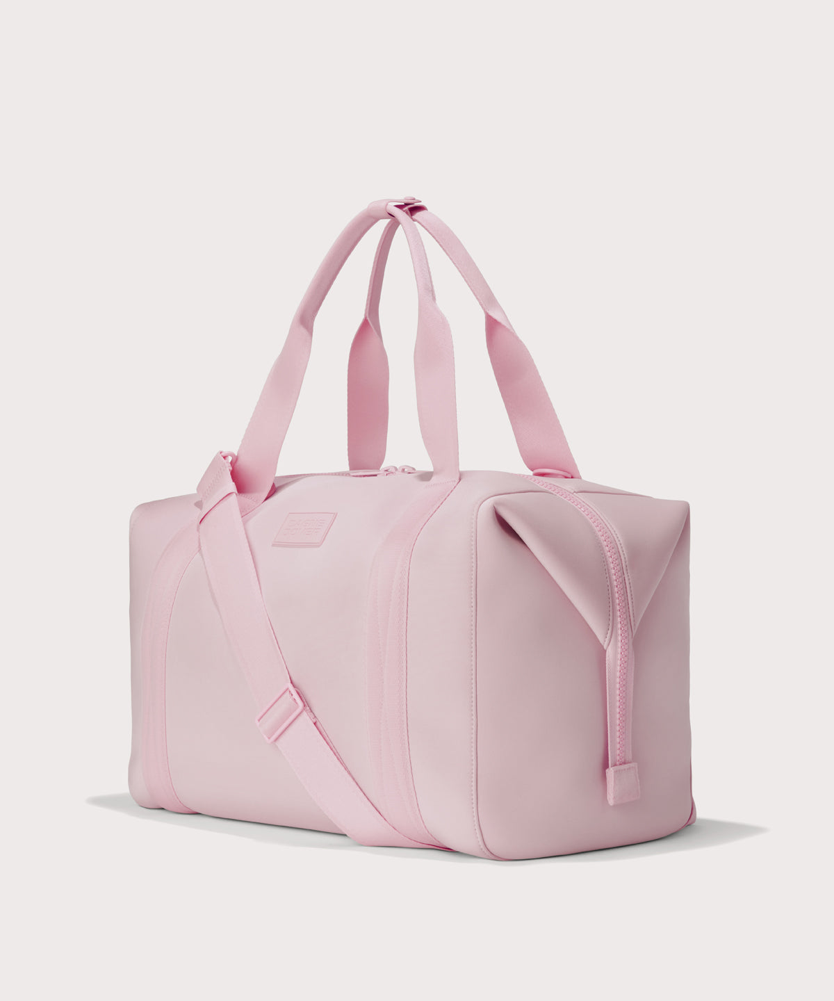Extra large Landon Carryall in a cool, powdery pink with soft grey undertones, angle view
