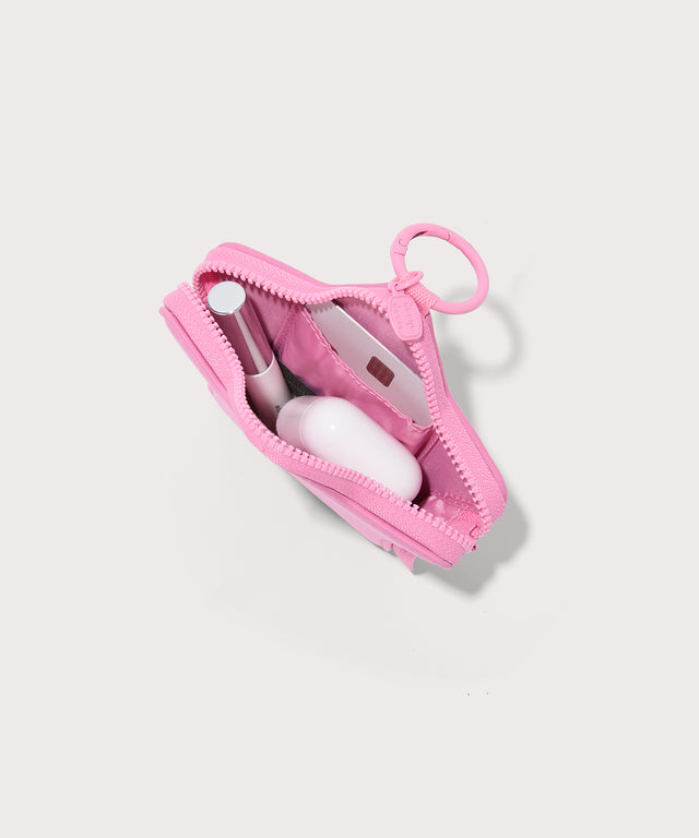 Dagne Dover Star Keychain in a true bubble gum pink seen from above showcasing a card slot.