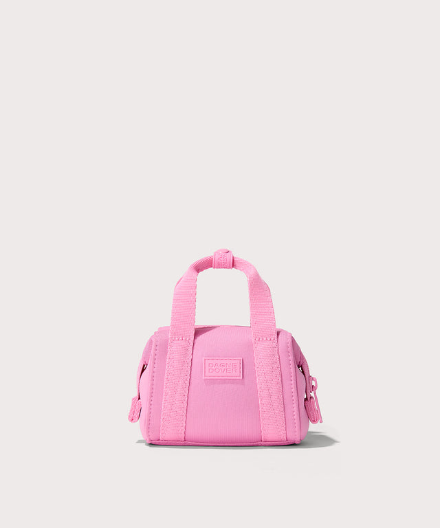 Dagne Dover Micro Landon Crossbody in a true bubble gum pink with the crossbody strap unclipped.