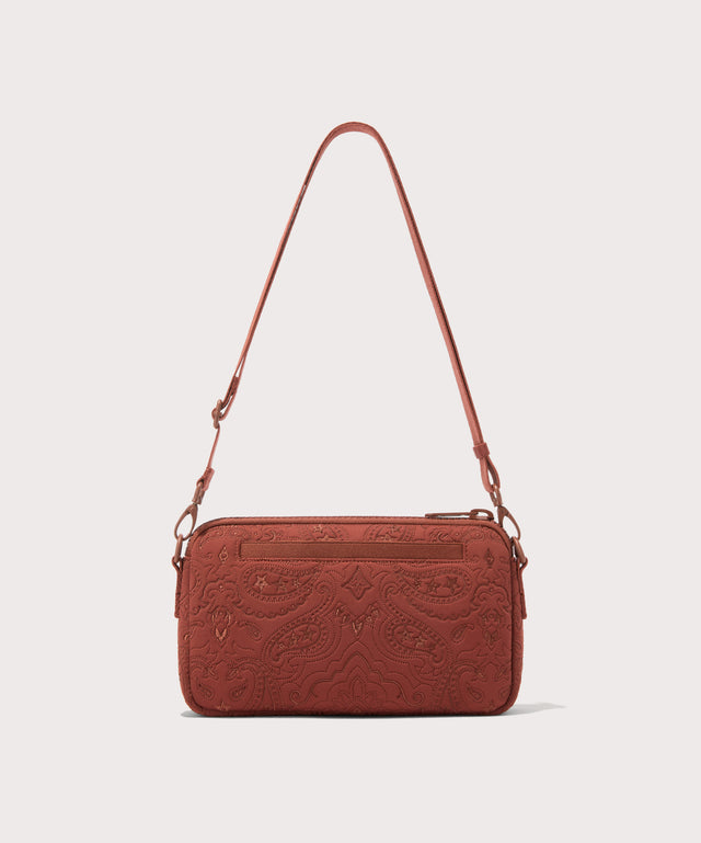Dagne Dover Nora Shoulder Bag in a rich, warm brown with an embroidered paisley print seen from the back.