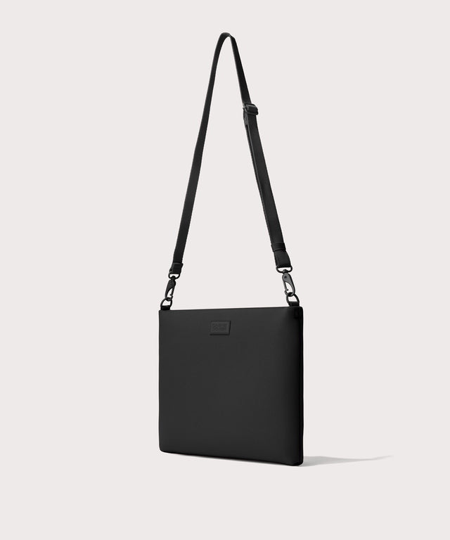14 inch laptop shoulder bag in a black seen from the angle view.
