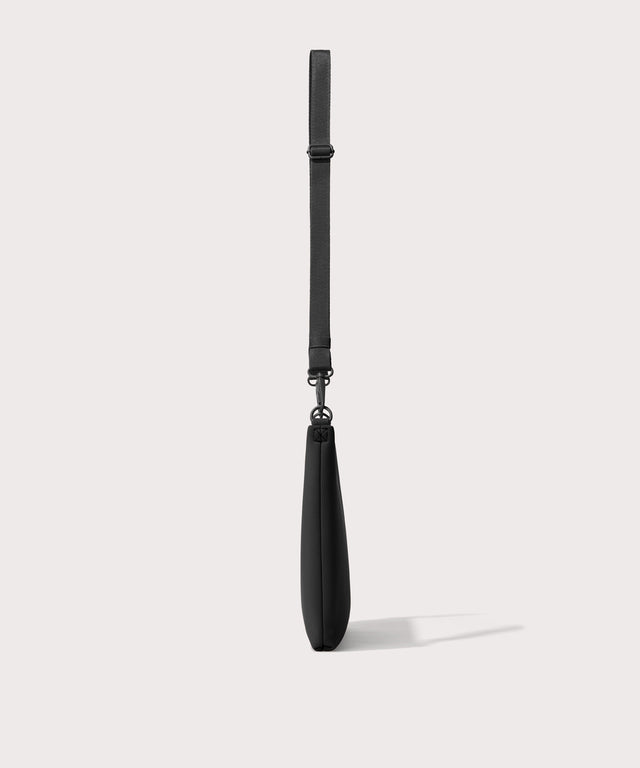 14 inch laptop shoulder bag in a black seen from the side.