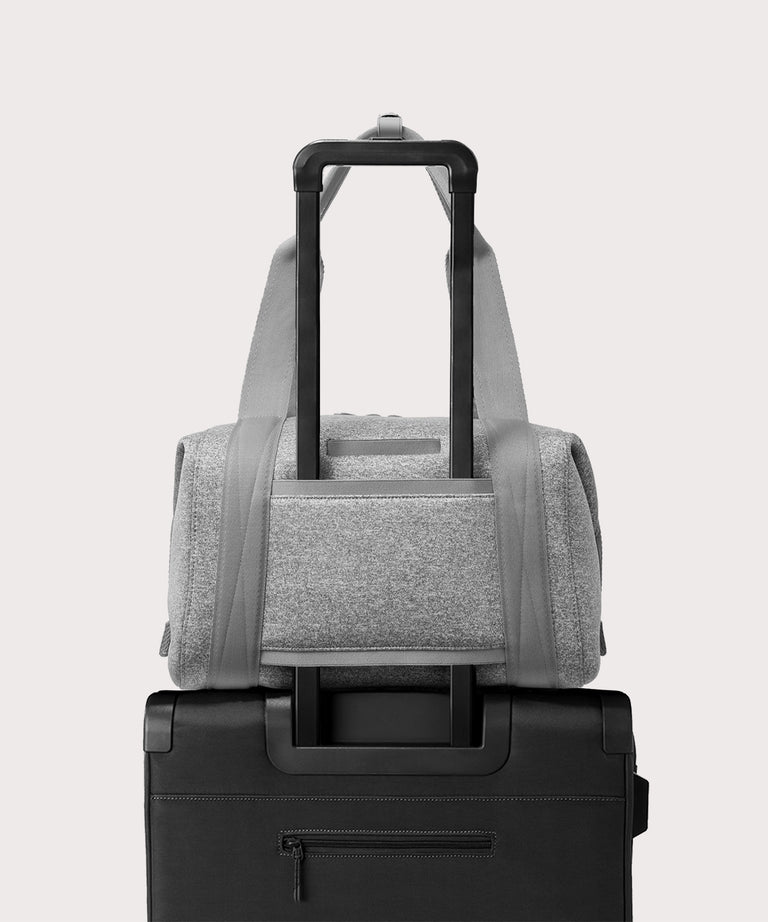 Large Landon Carryall in grey displaying luggage sleeve
