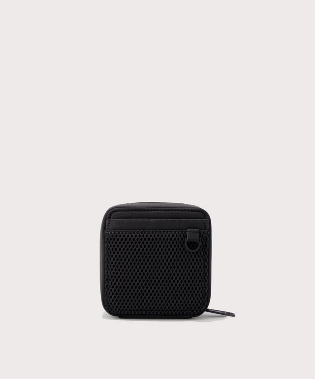 Dagne Dover small Arlo Tech Organizer in black seen from the back.