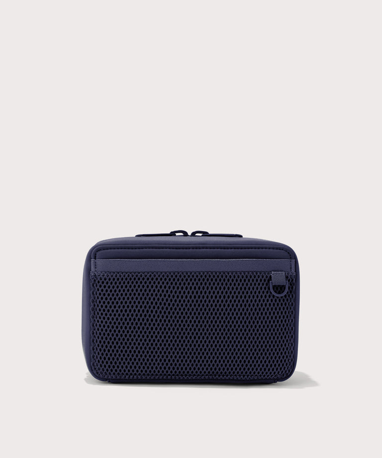 Dagne Dover large Arlo Tech Organizer in dark blue seen from the back.