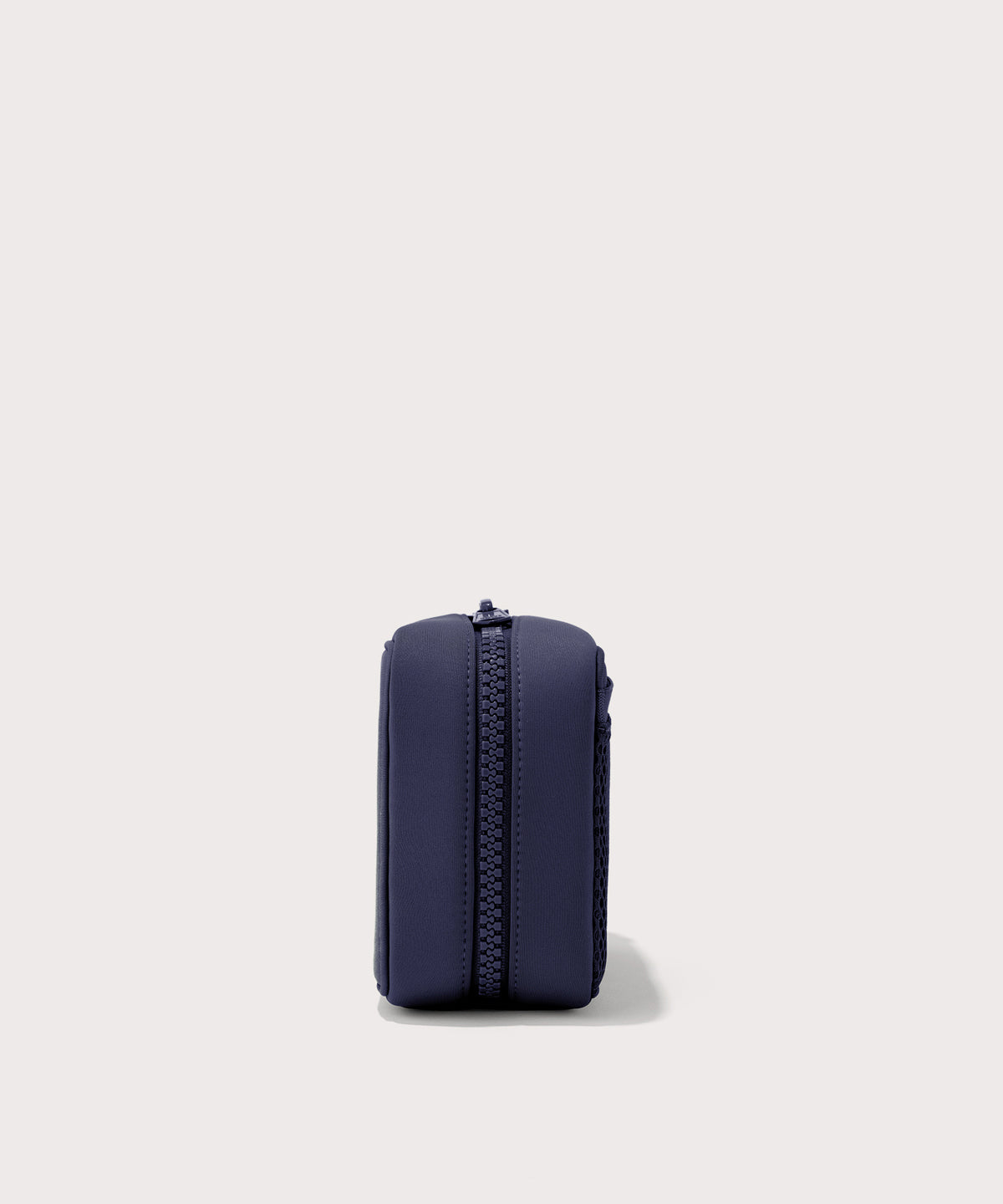 Dagne Dover large Arlo Tech Organizer in dark blue seen from the side.