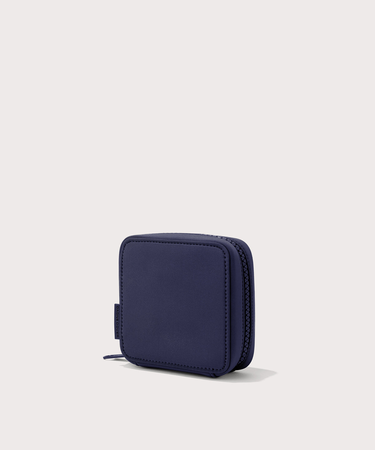 Dagne Dover small Arlo Tech Organizer in  dark blue seen from an angle.