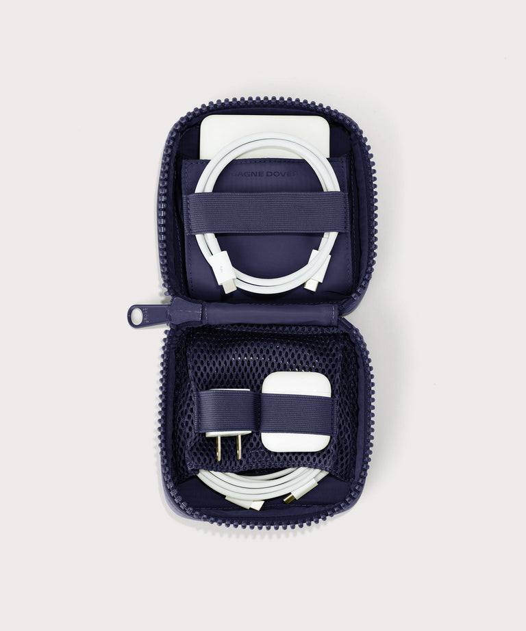 hover - Dagne Dover small Arlo Tech Organizer in  dark blue unzipped, revealing the interior elastic loops and airmesh pockets.