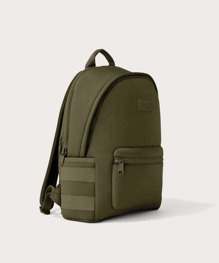 Dagne Dover large Dakota Neoprene Backpack in dark moss seen from an angle.
