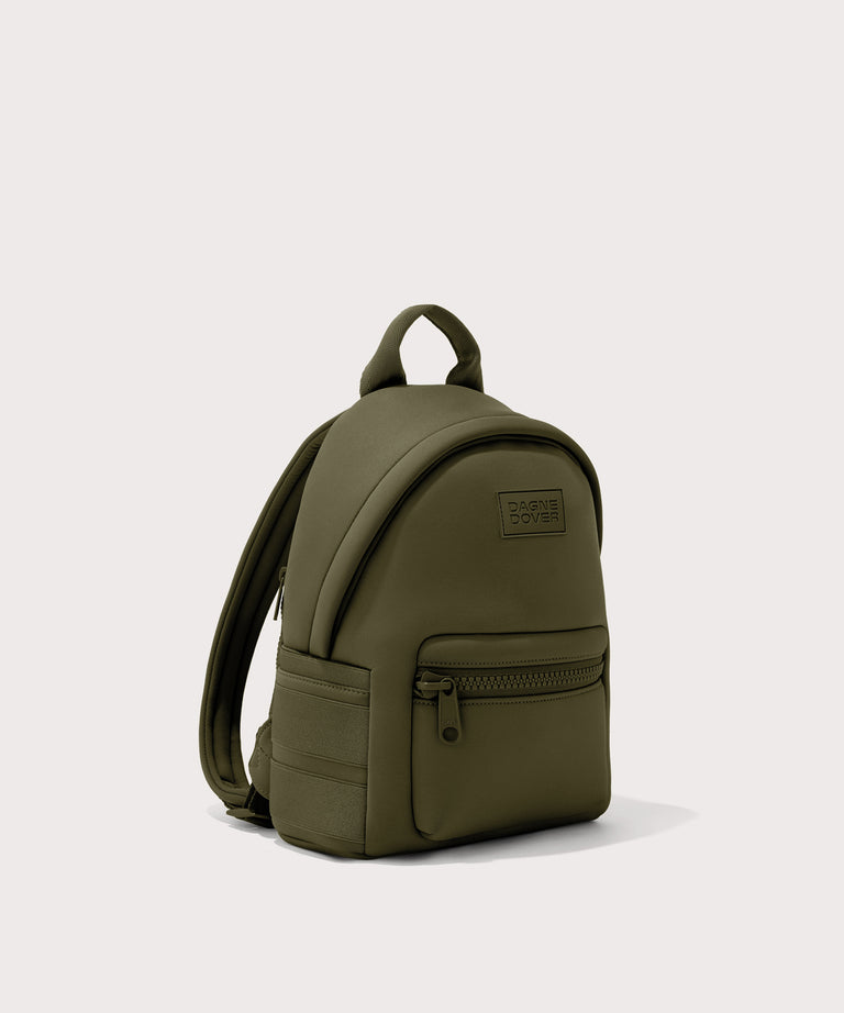 Dagne Dover small Dakota Neoprene Backpack in dark moss seen from an angle.
