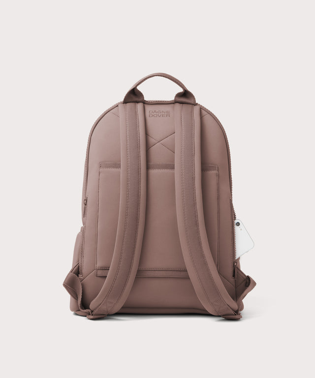 Dagne Dover large Dakota Neoprene Backpack in pink seen from the back.
