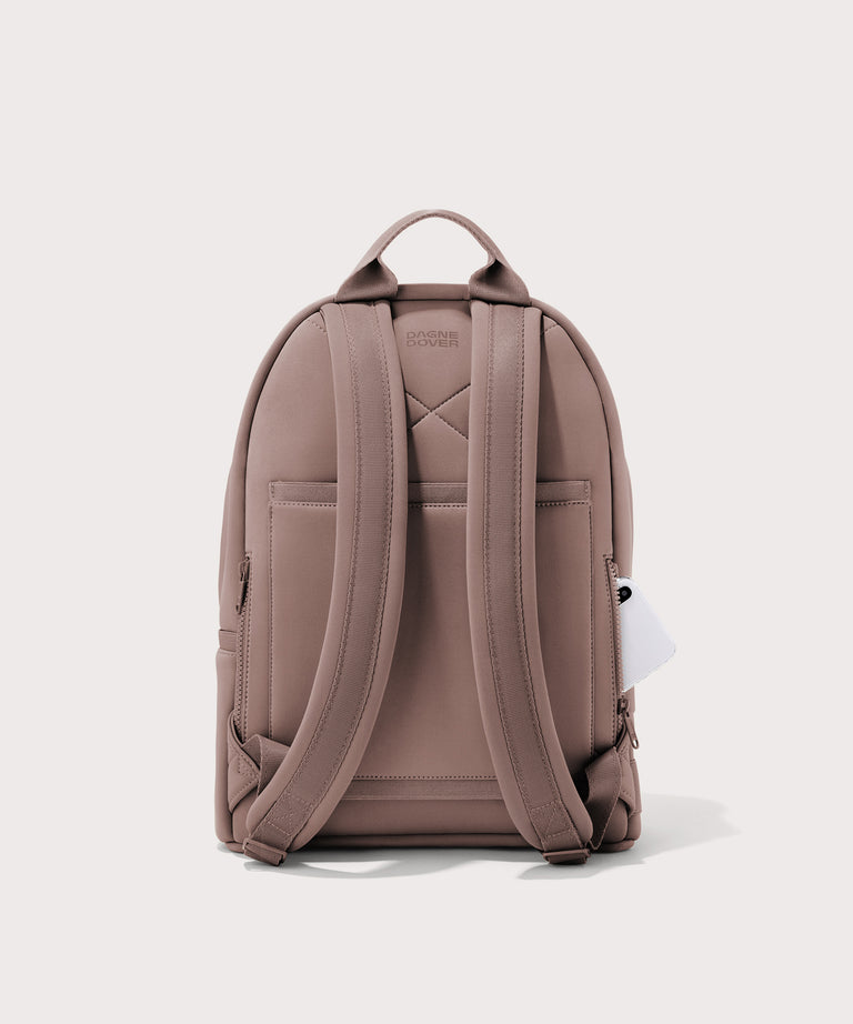 Dagne Dover medium Dakota Neoprene Backpack in pink seen from the back.
