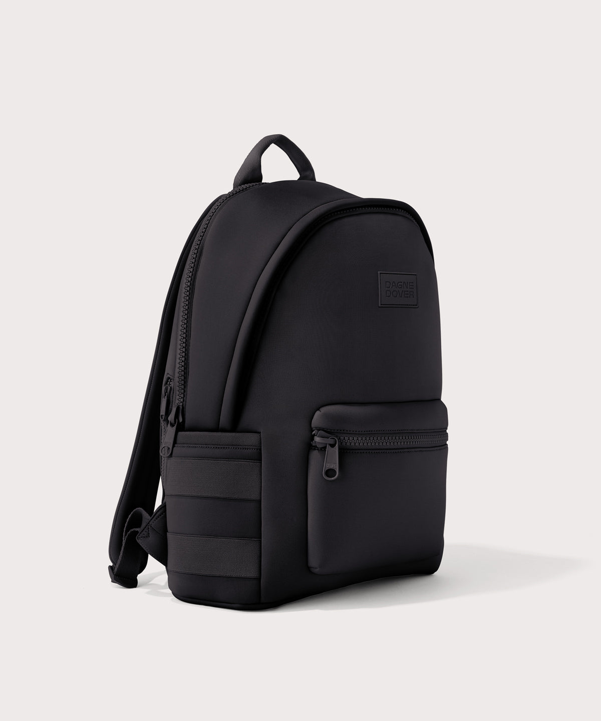 Dagne Dover large Dakota Neoprene Backpack in black seen from an angle.
