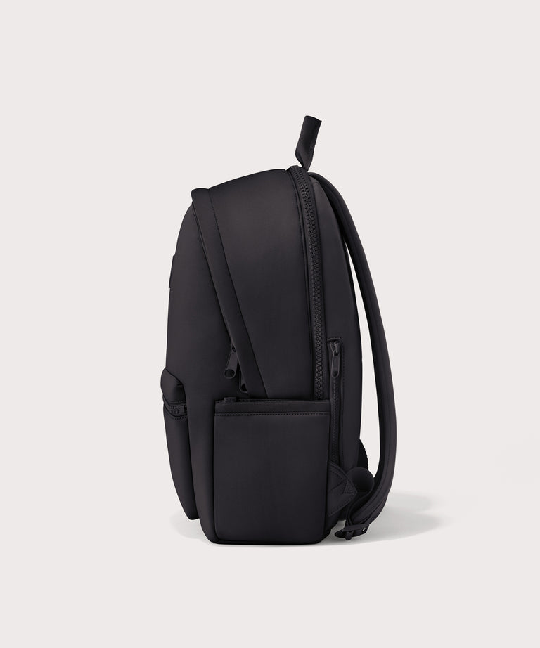 Dagne Dover large Dakota Neoprene Backpack in black seen from the side.
