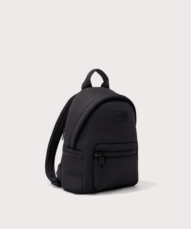 Dagne Dover small Dakota Neoprene Backpack in black seen from an angle.
