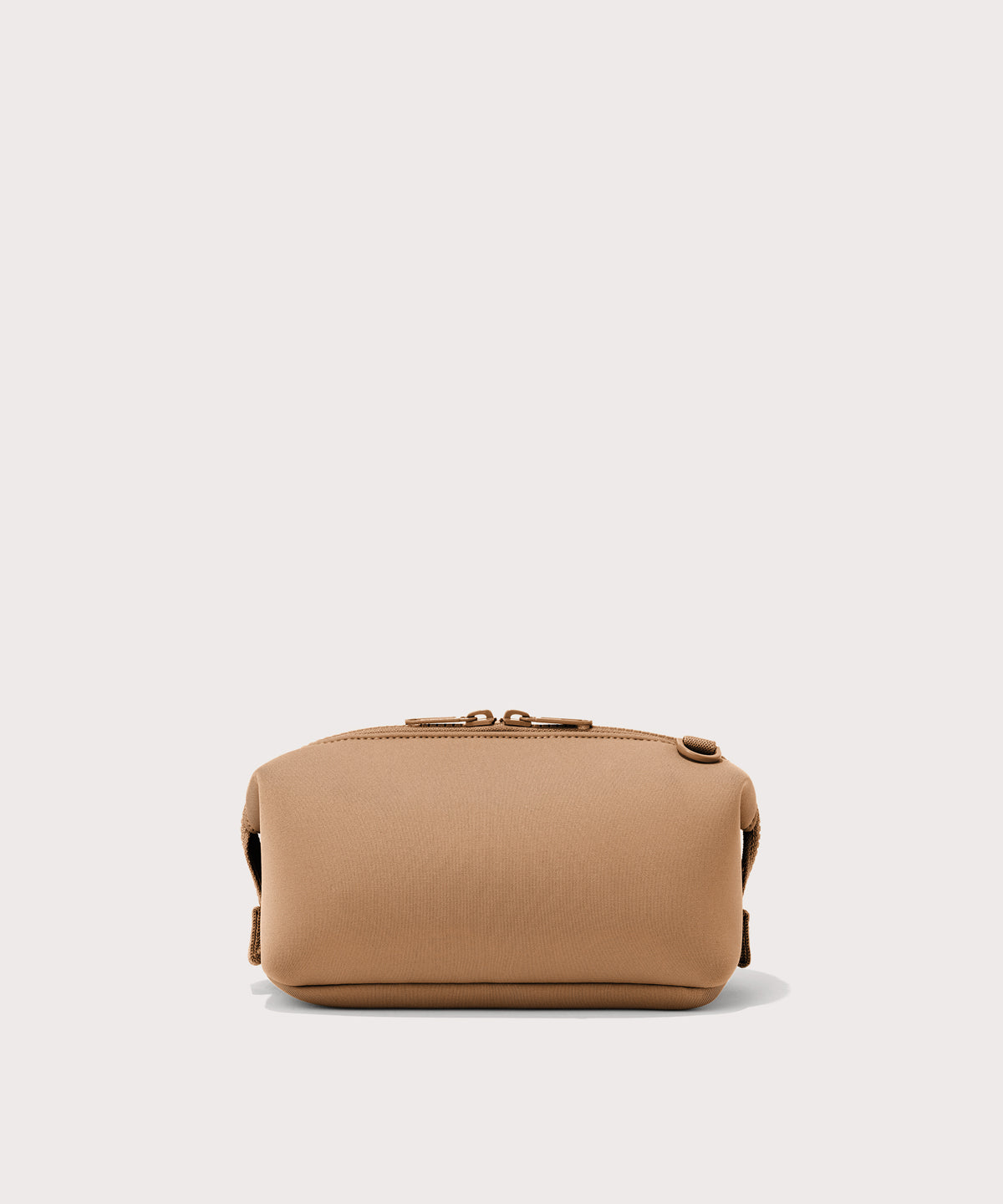 Dagne Dover Small Hunter Toiletry Bag in camel seen from the back.
