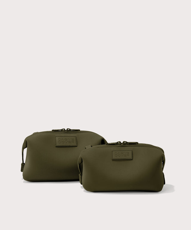 Dagne Dover Small and Large Hunter Toiletry Bags in dark moss.
