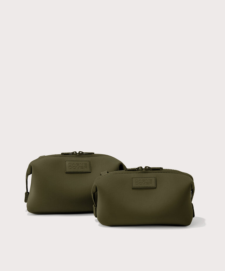 Dagne Dover Small and Large Hunter Toiletry Bags in dark moss.

