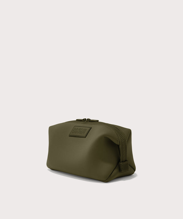 Dagne Dover Large Hunter Toiletry Bag in dark moss seen from an angle.
