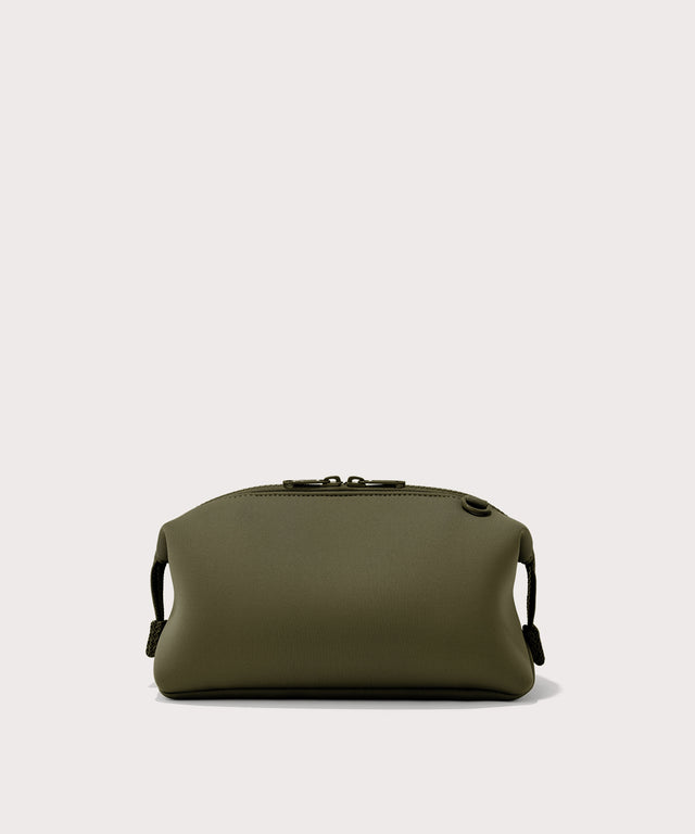 Dagne Dover Large Hunter Toiletry Bag in dark moss seen from the back.
