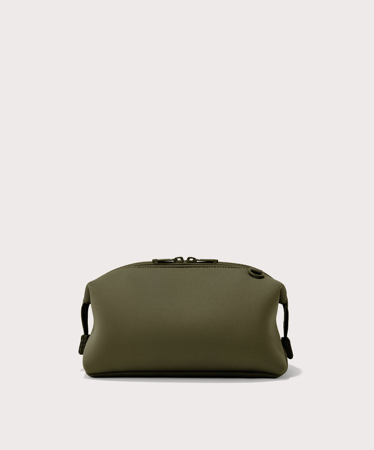 Dagne Dover Large Hunter Toiletry Bag in dark moss seen from the back.
