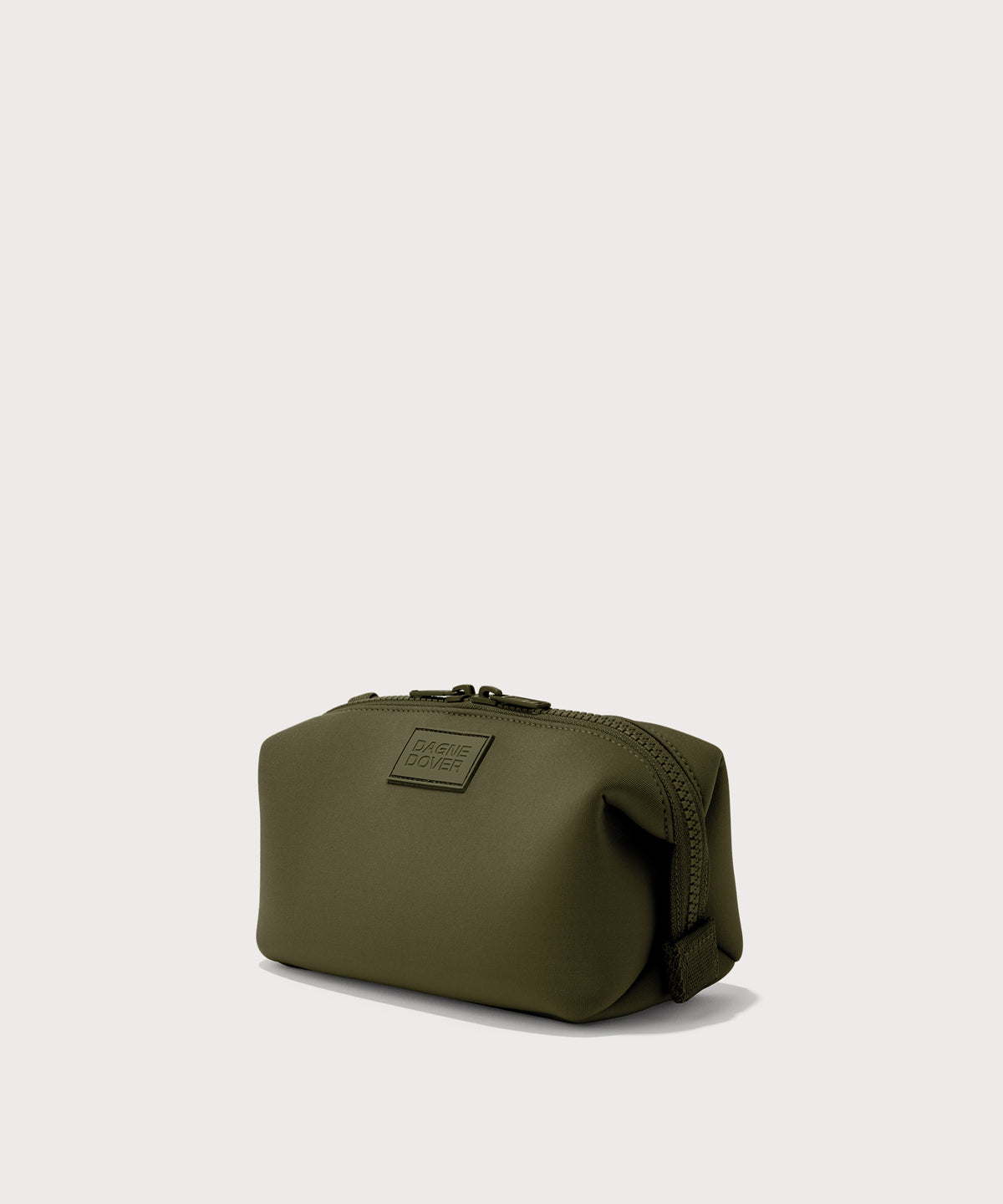 Dagne Dover Small Hunter Toiletry Bag in dark moss seen from an angle.
