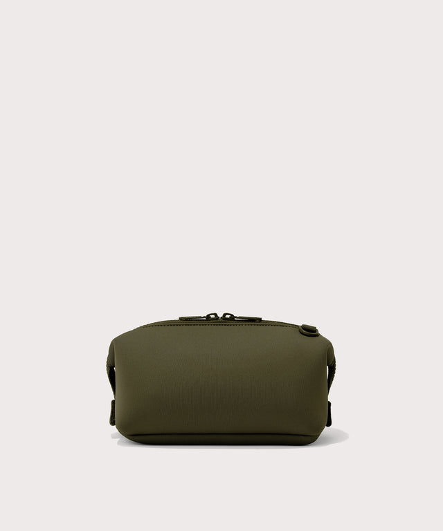 Dagne Dover Small Hunter Toiletry Bag in dark moss seen from the back.

