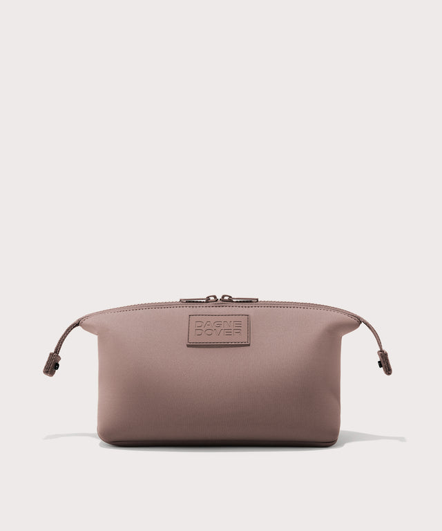 Dagne Dover Large Hunter Toiletry Bag in pink with sides unclipped.
