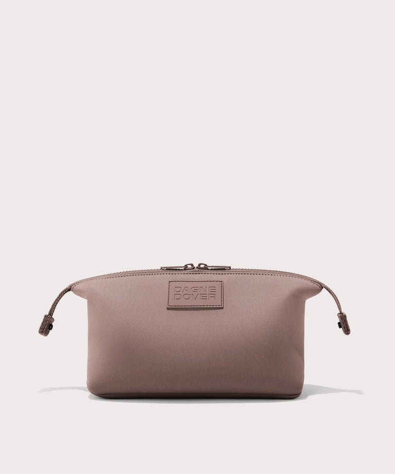 Dagne Dover Large Hunter Toiletry Bag in pink with sides unclipped.
