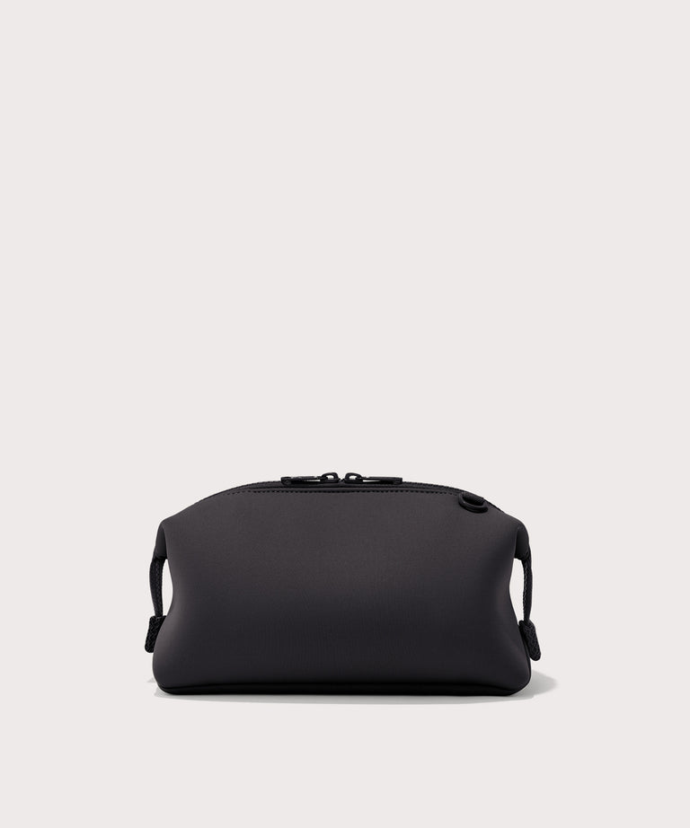 Dagne Dover Large Hunter Toiletry Bag in black seen from the back.
