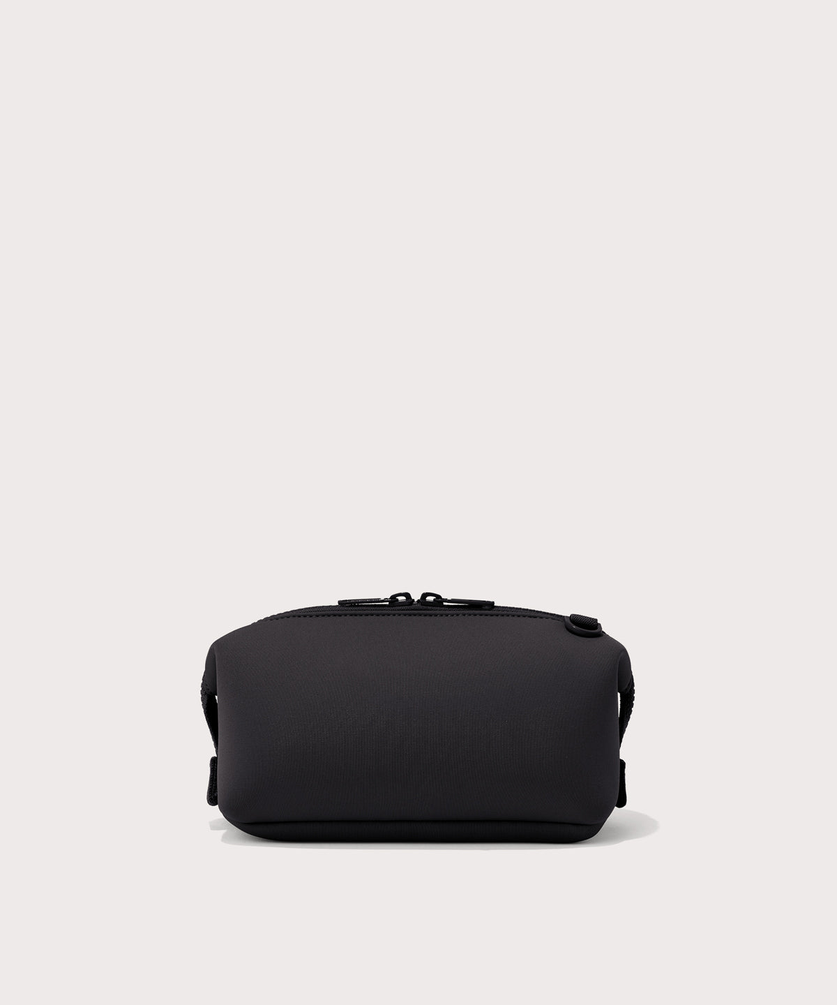 Dagne Dover Small Hunter Toiletry Bag in black seen from the back.
